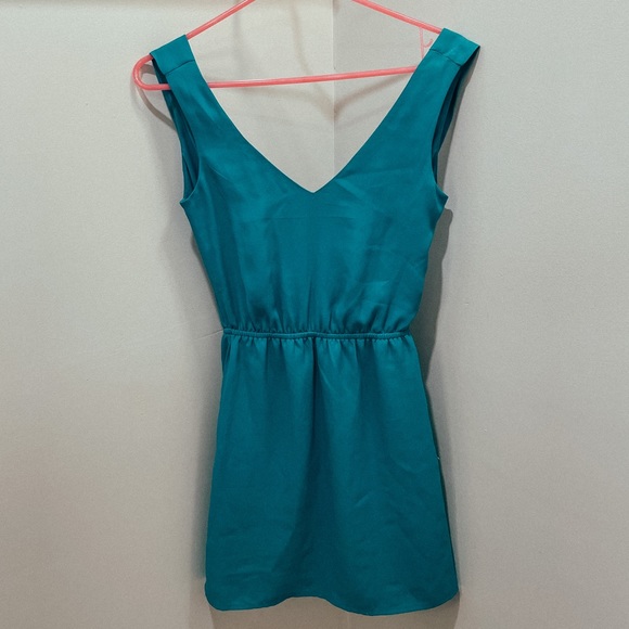 Turquoise cocktail dress with draped open back - Picture 4 of 5
